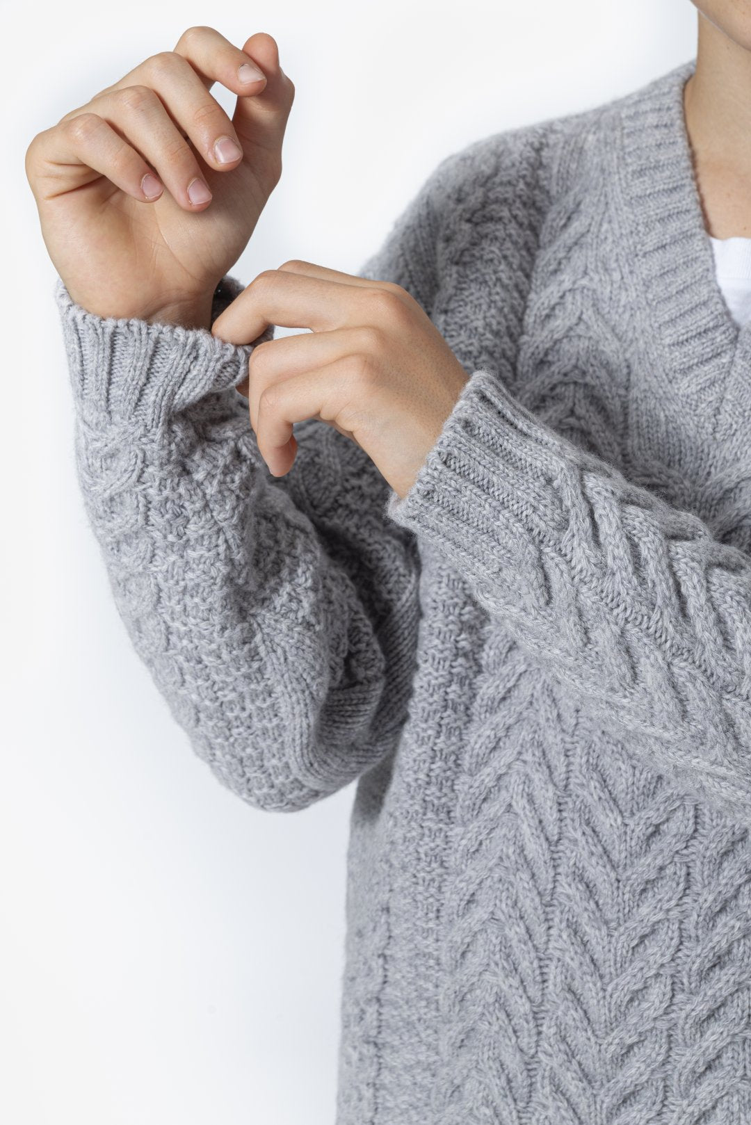 V-neck sweater with cables in 100% gray wool
